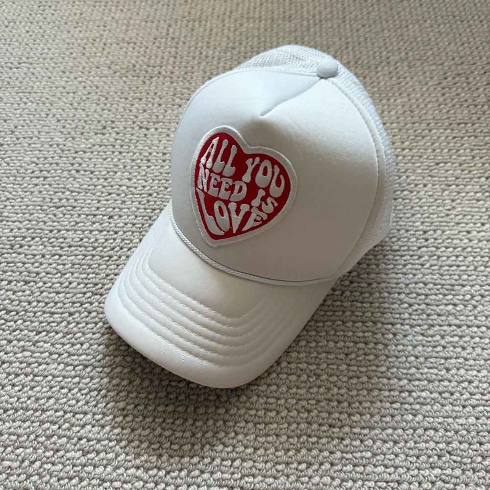 All you need is love red and white trucker hat